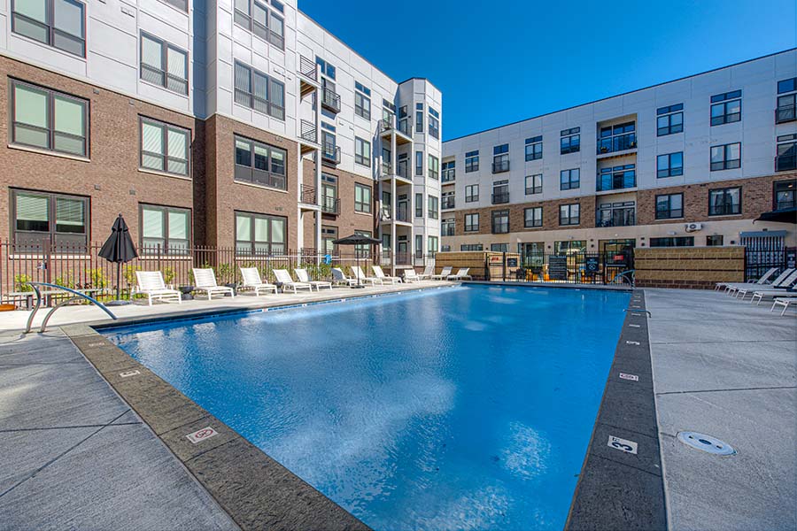 Outdoor swimming pool at apartment complex